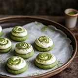 A plate of green and white cookies.