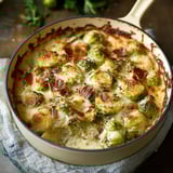 A dish of vegetables and cheese.