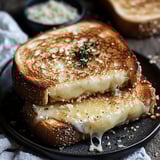 A plate of grilled cheese sandwiches.